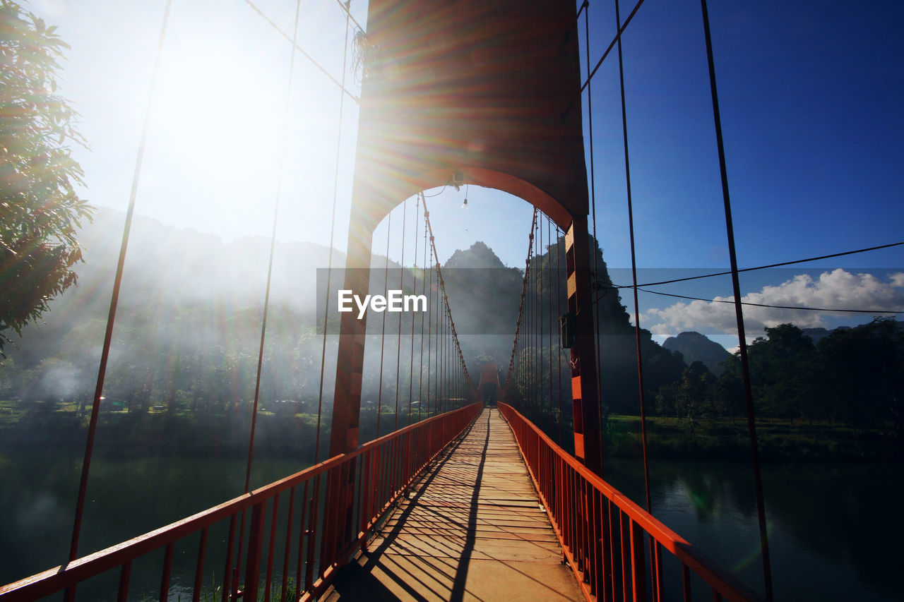 VIEW OF FOOTBRIDGE AGAINST SKY