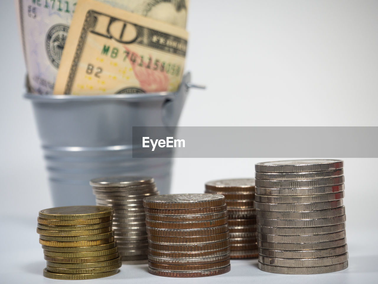 CLOSE-UP OF STACK OF COINS