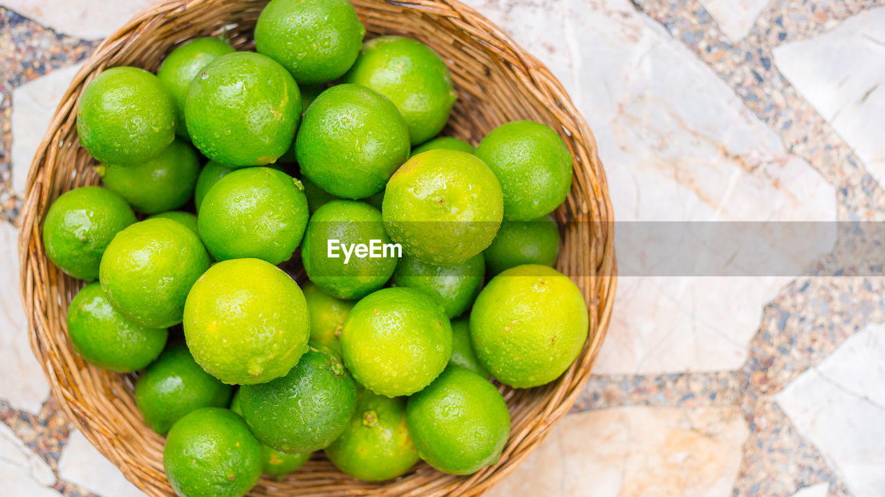 HIGH ANGLE VIEW OF FRUITS IN BASKET