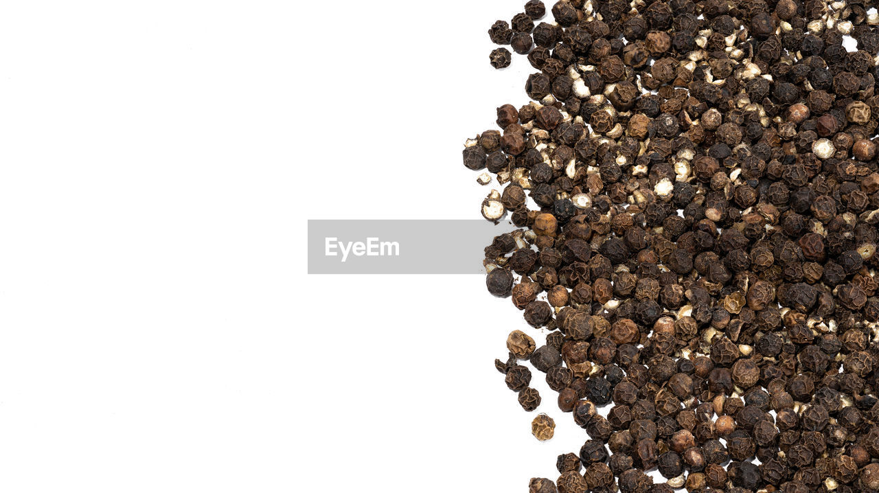 food and drink, food, roasted coffee bean, large group of objects, produce, copy space, white background, coffee, studio shot, freshness, abundance, indoors, soil, no people, still life, brown, seed, close-up, cut out, drink, healthy eating, nature, black, refreshment