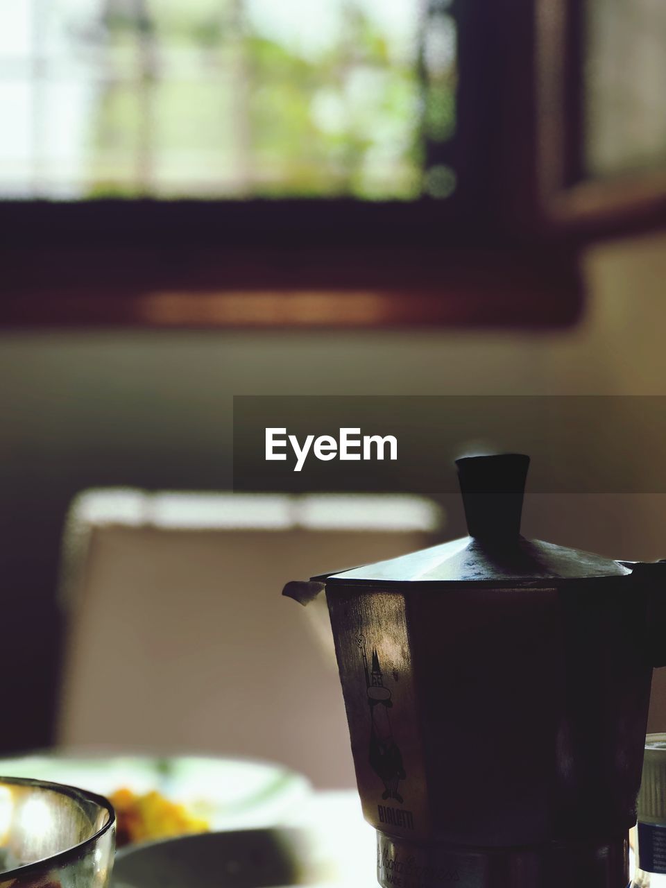 Close-up of italian coffee carafe on table