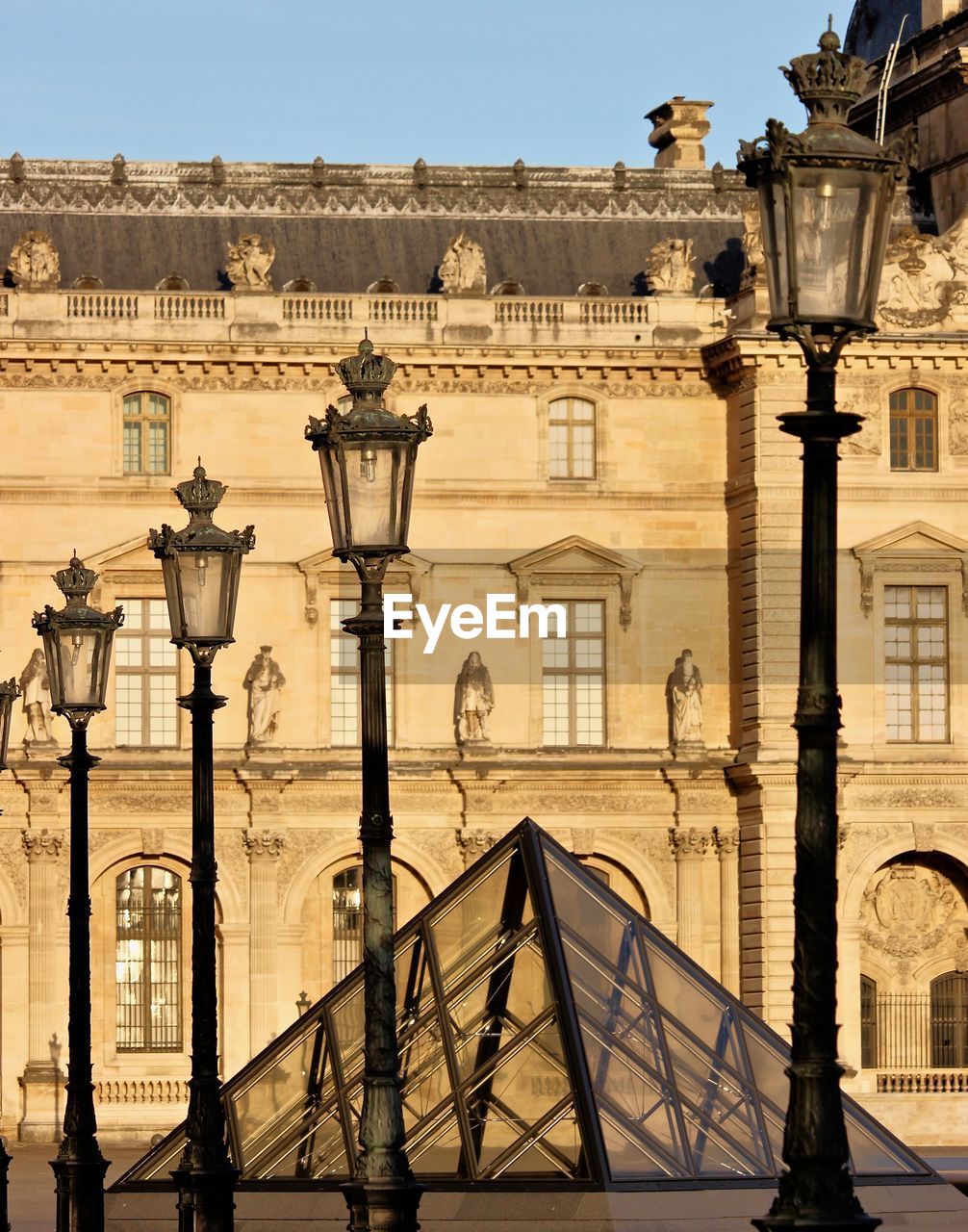 STREET LIGHT AGAINST BUILDINGS