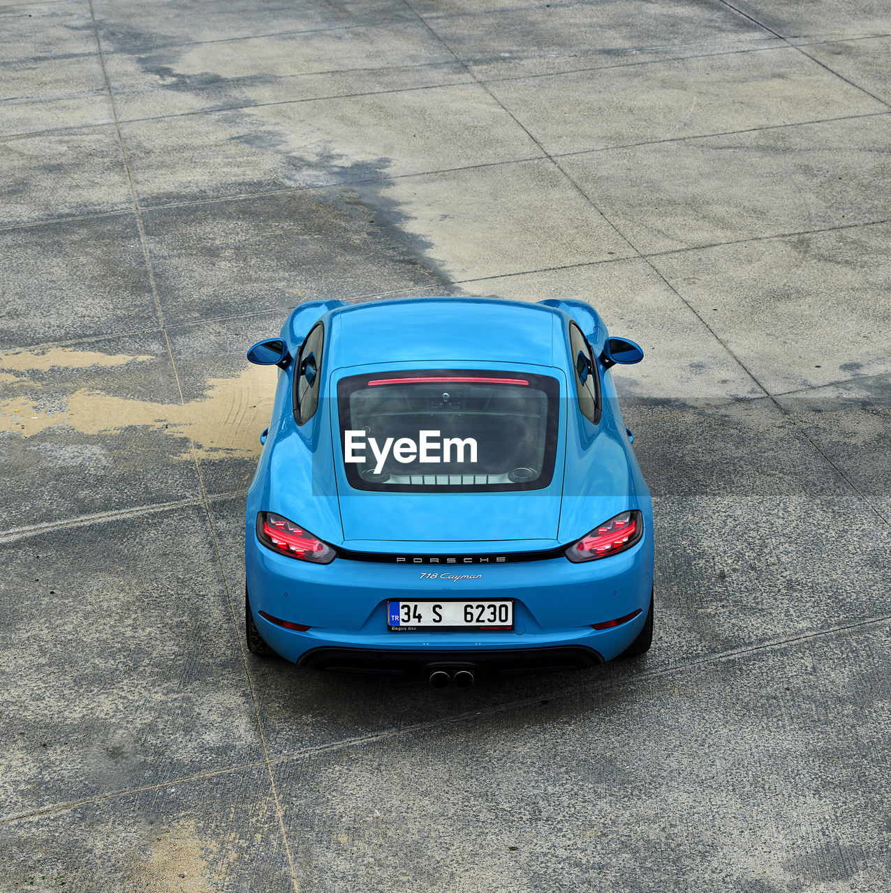 HIGH ANGLE VIEW OF CAR ON STREET