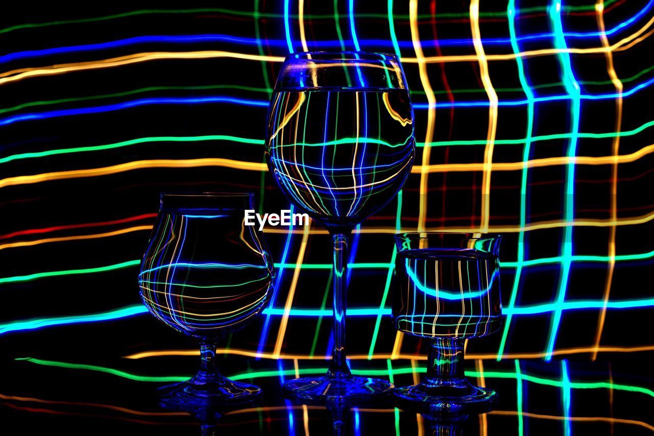 Wineglasses against light painting