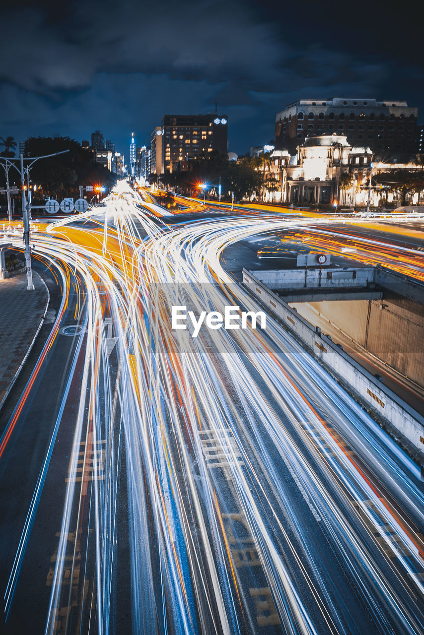 High angle view of light trails on road at night