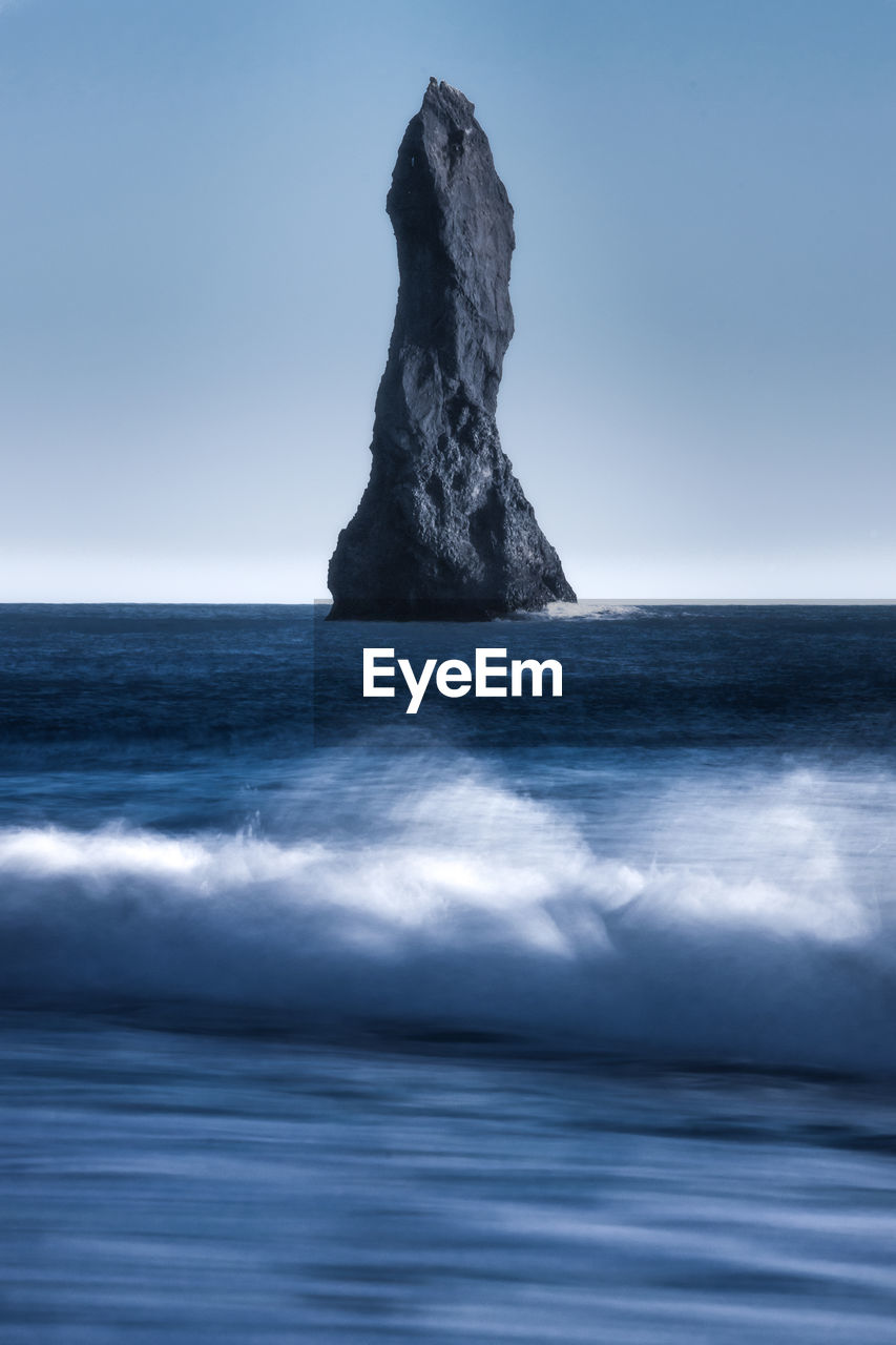 View of the rock formations in the reynisfjara black beach in vik, iceland