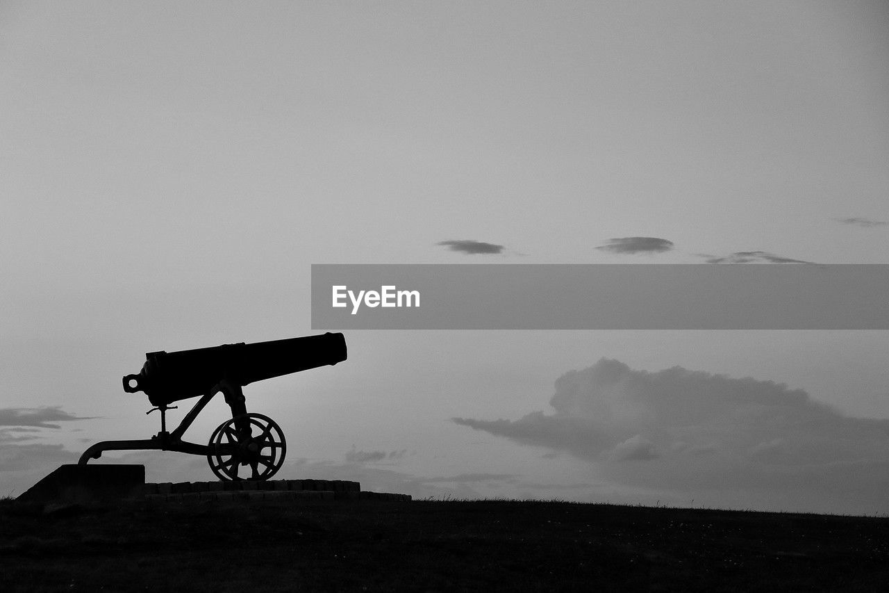 sky, black and white, nature, monochrome, monochrome photography, silhouette, vehicle, transportation, no people, wind, horizon, darkness, cloud, land, outdoors, white, sea, environment, mode of transportation, black, beauty in nature, day