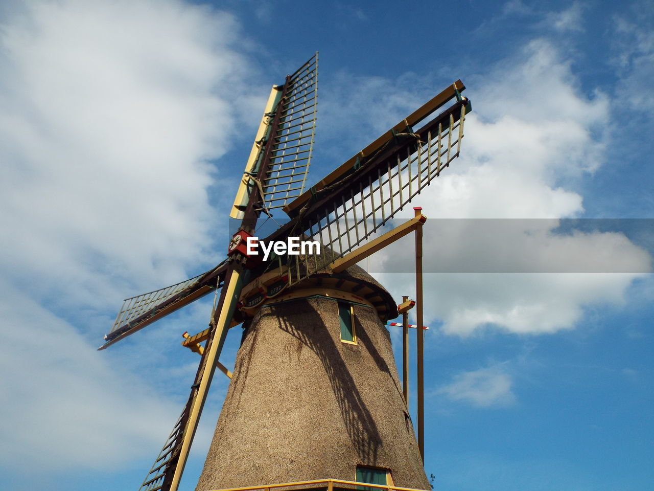 LOW ANGLE VIEW OF WINDMILL