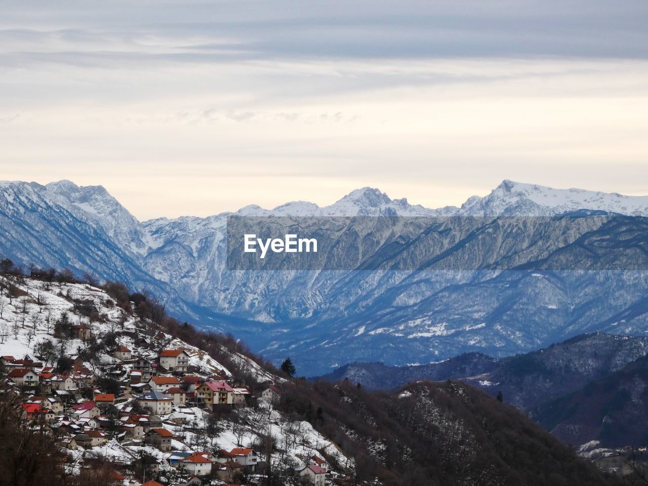 Scenic view of snowcapped mountains against sky