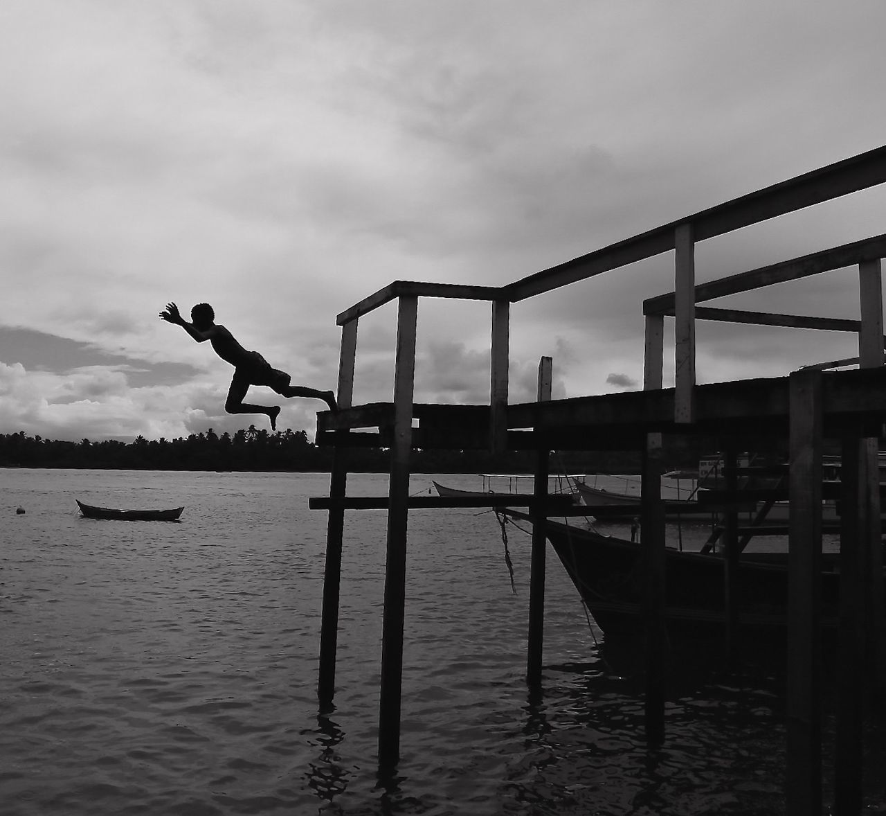 Man jumping in river