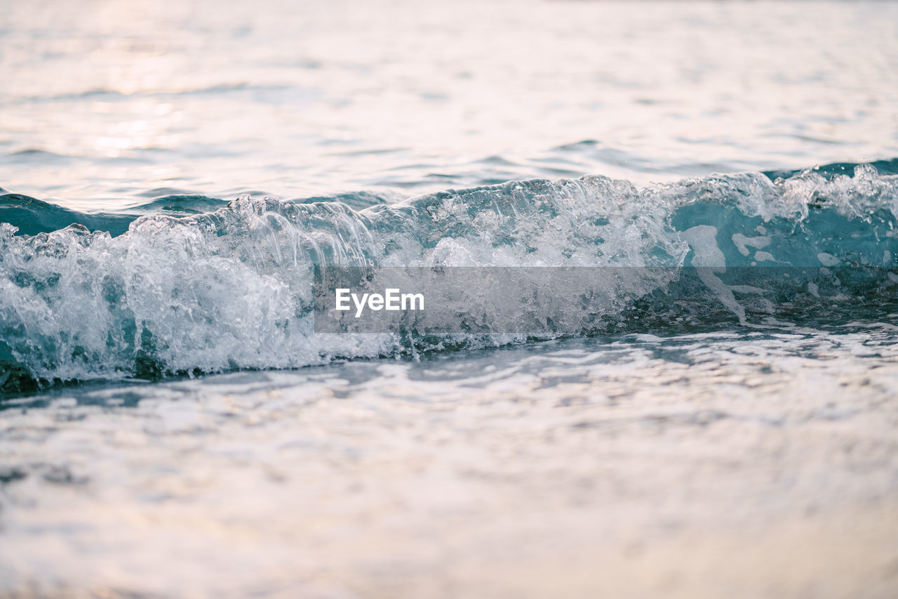 WAVES SPLASHING ON SHORE