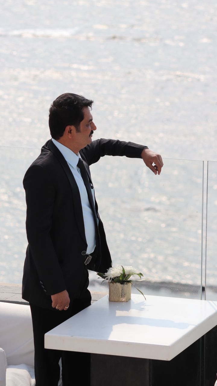 Businessman standing in restaurant