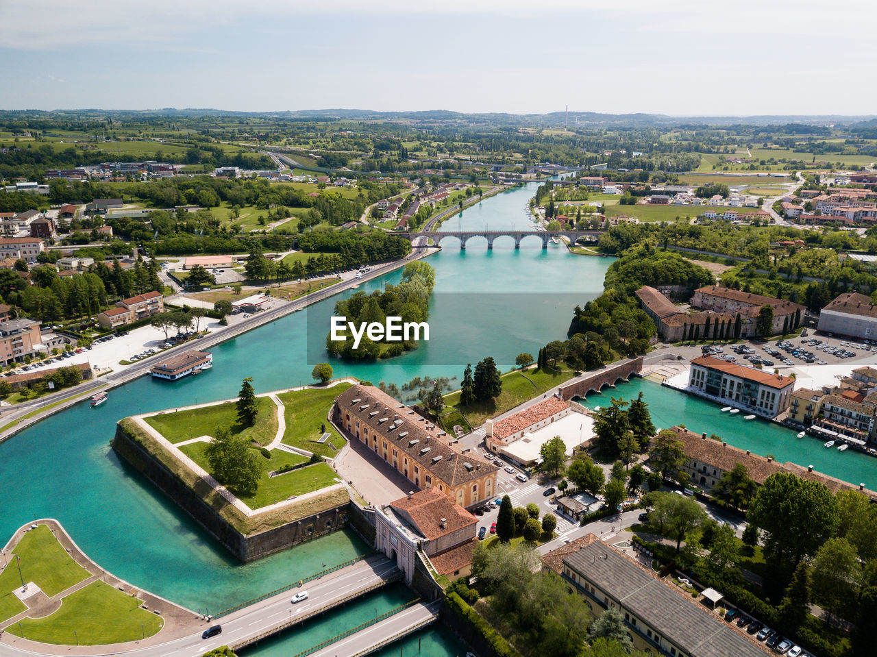 High angle view of river amidst buildings in city