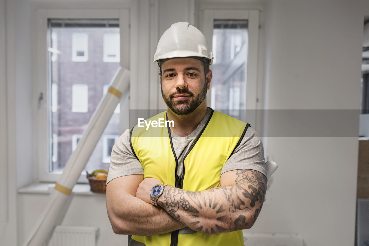 Portrait of worker wearing hardhat