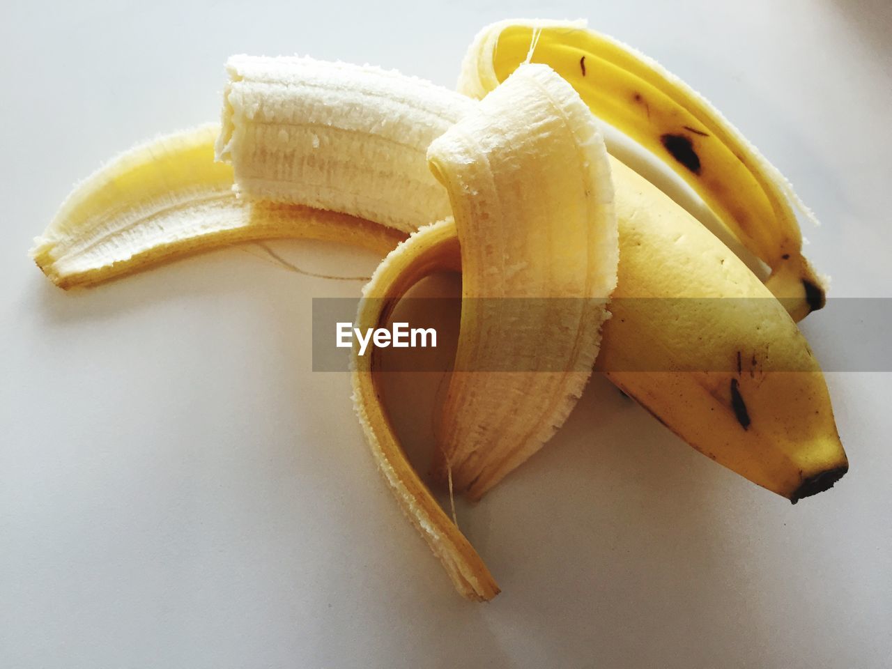 Close-up of half eaten banana on table