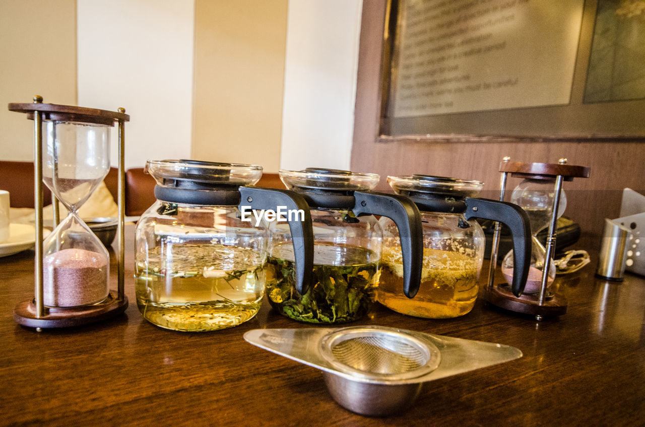 Close-up of kettles on table at restaurant