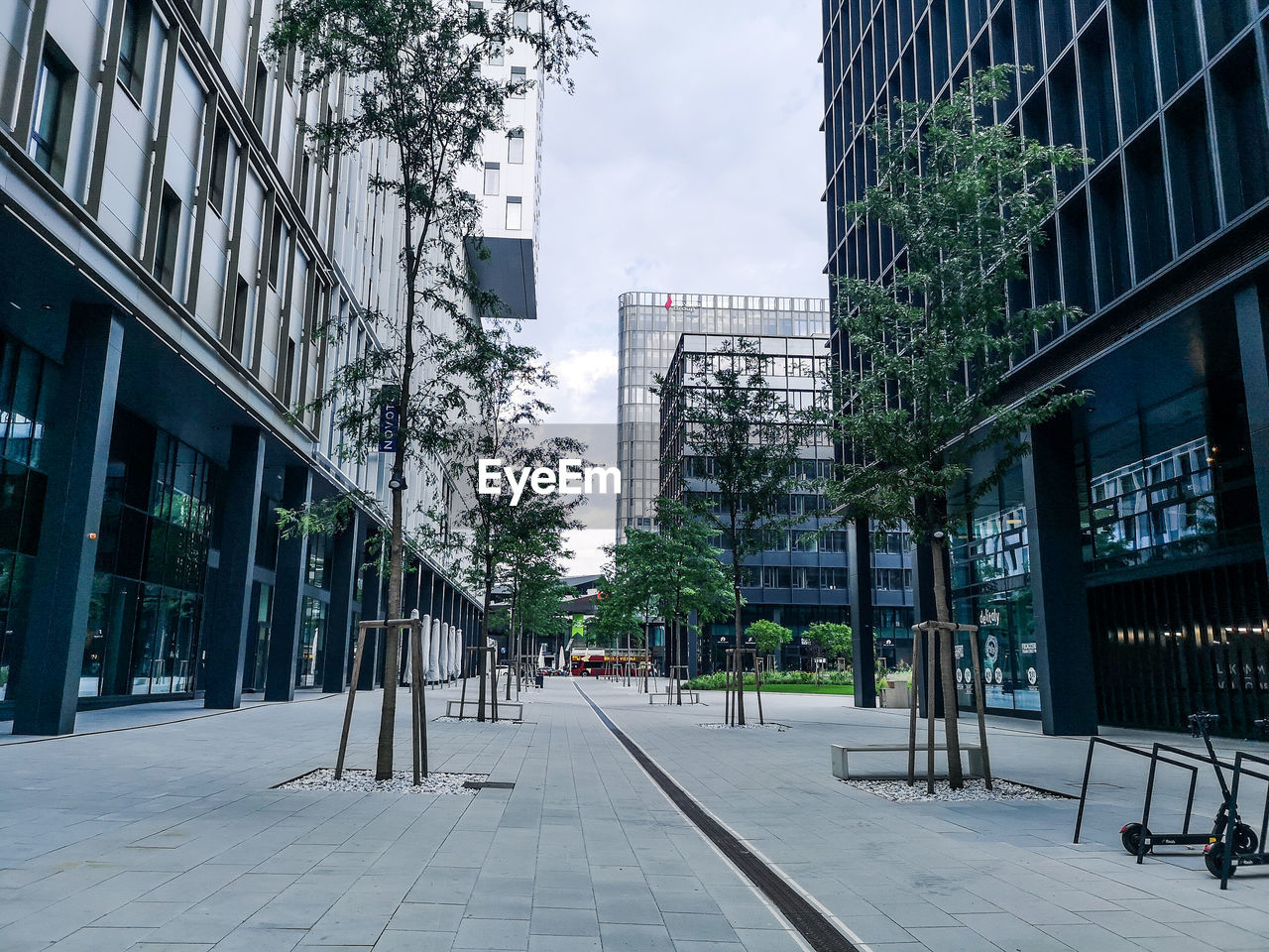 Street amidst buildings against sky