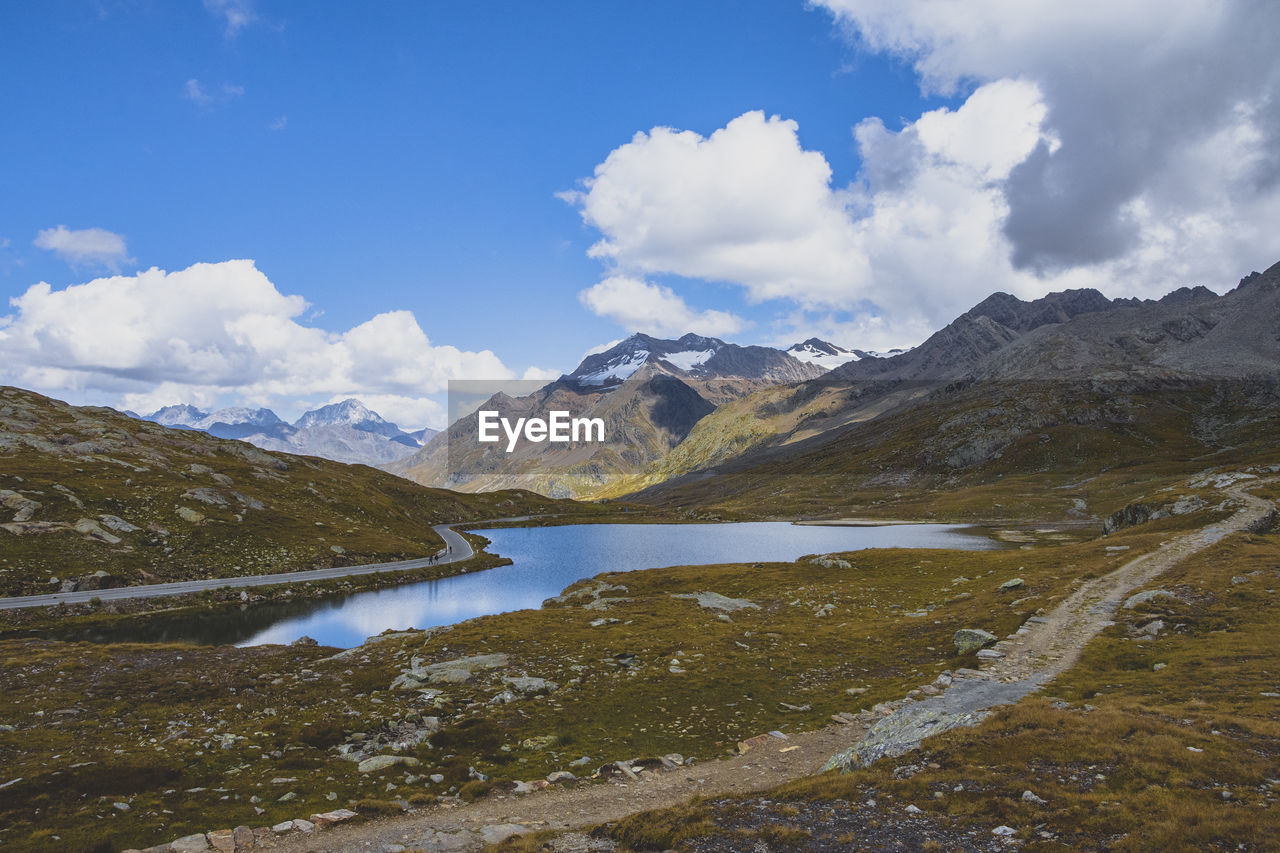 SCENIC VIEW OF LAKE AGAINST MOUNTAINS