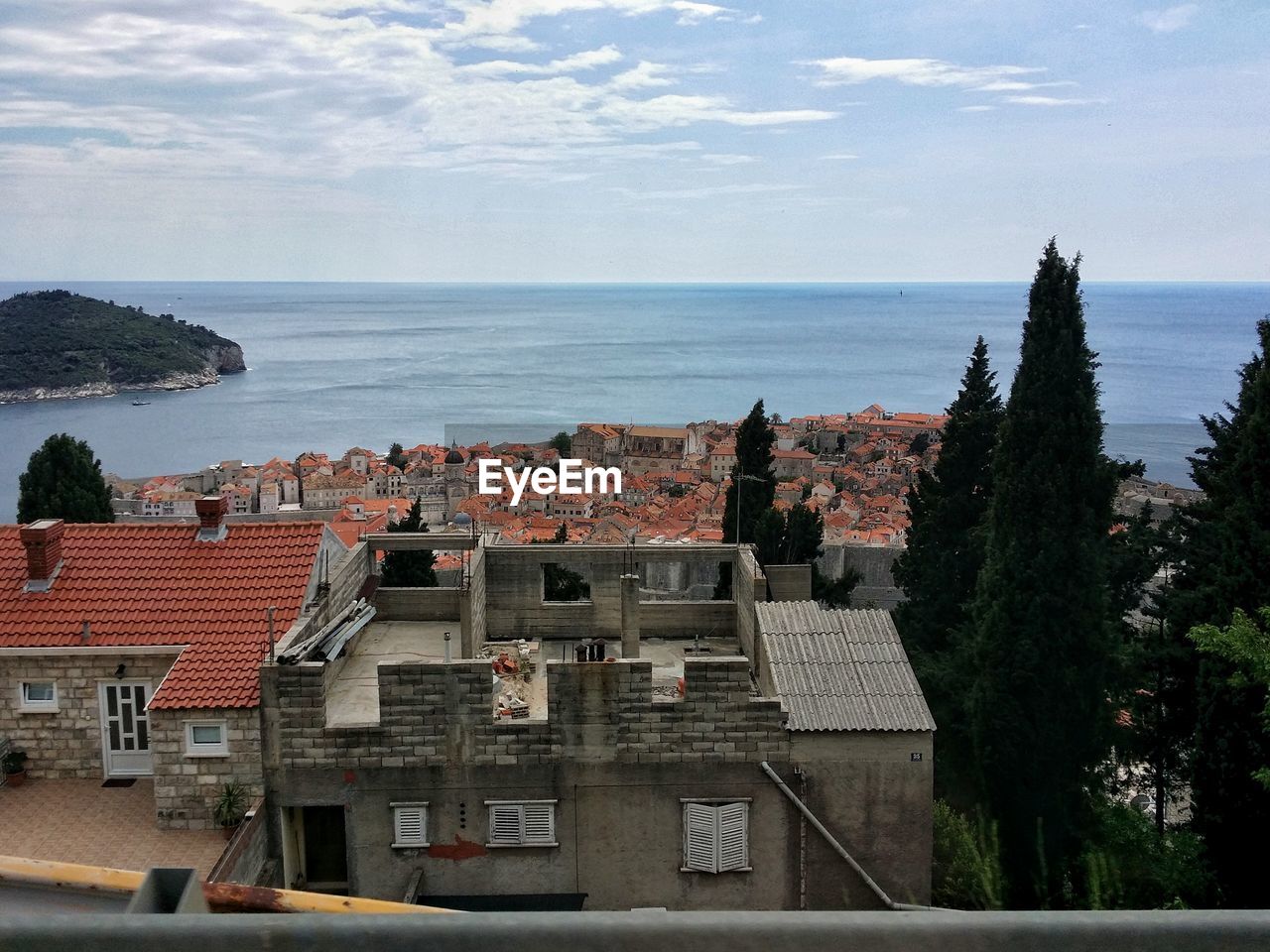 High angle view of houses against sea