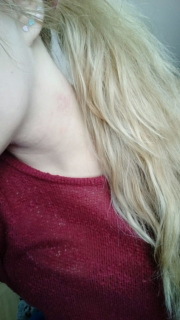 Lipstick kiss on woman's neck