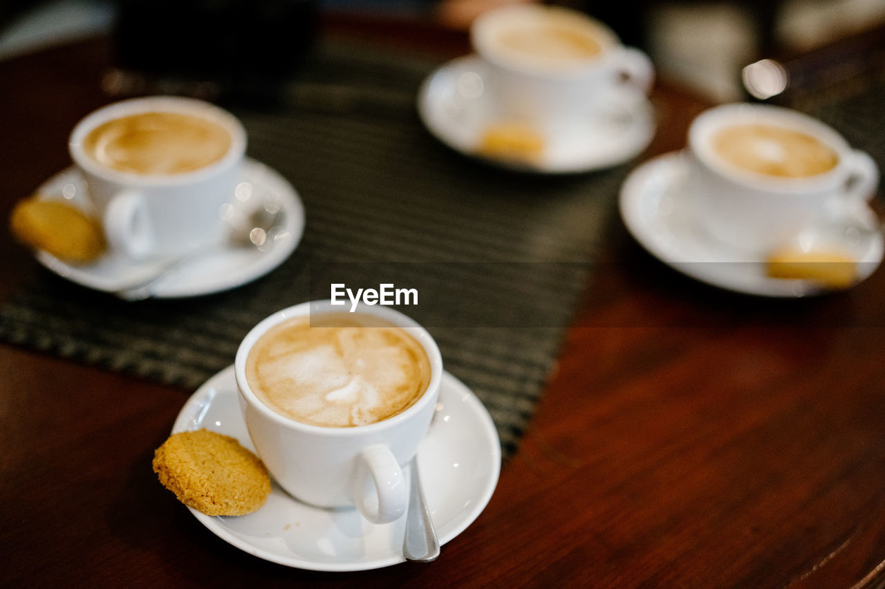 Close-up of coffee cup on table