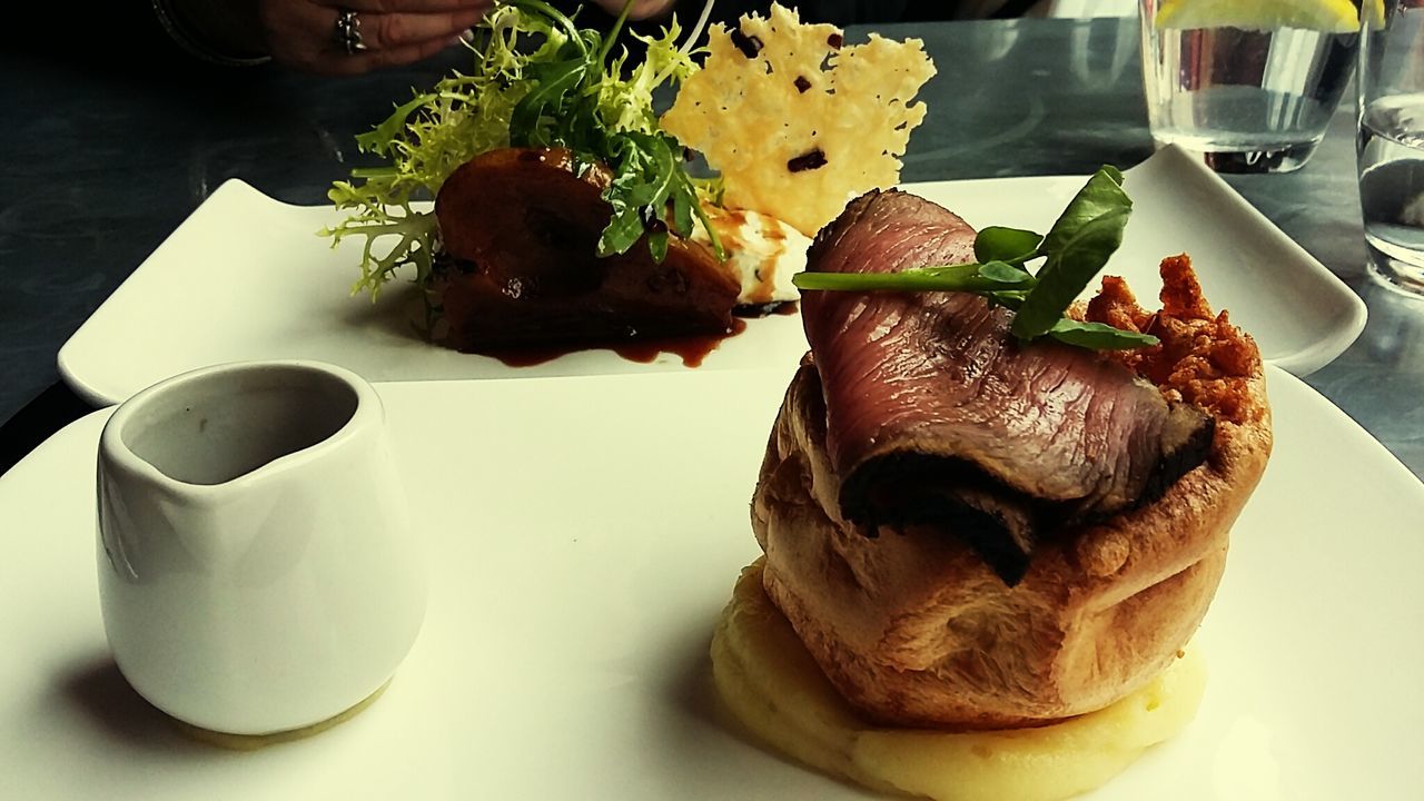 High angle view of meat served in plate at restaurant