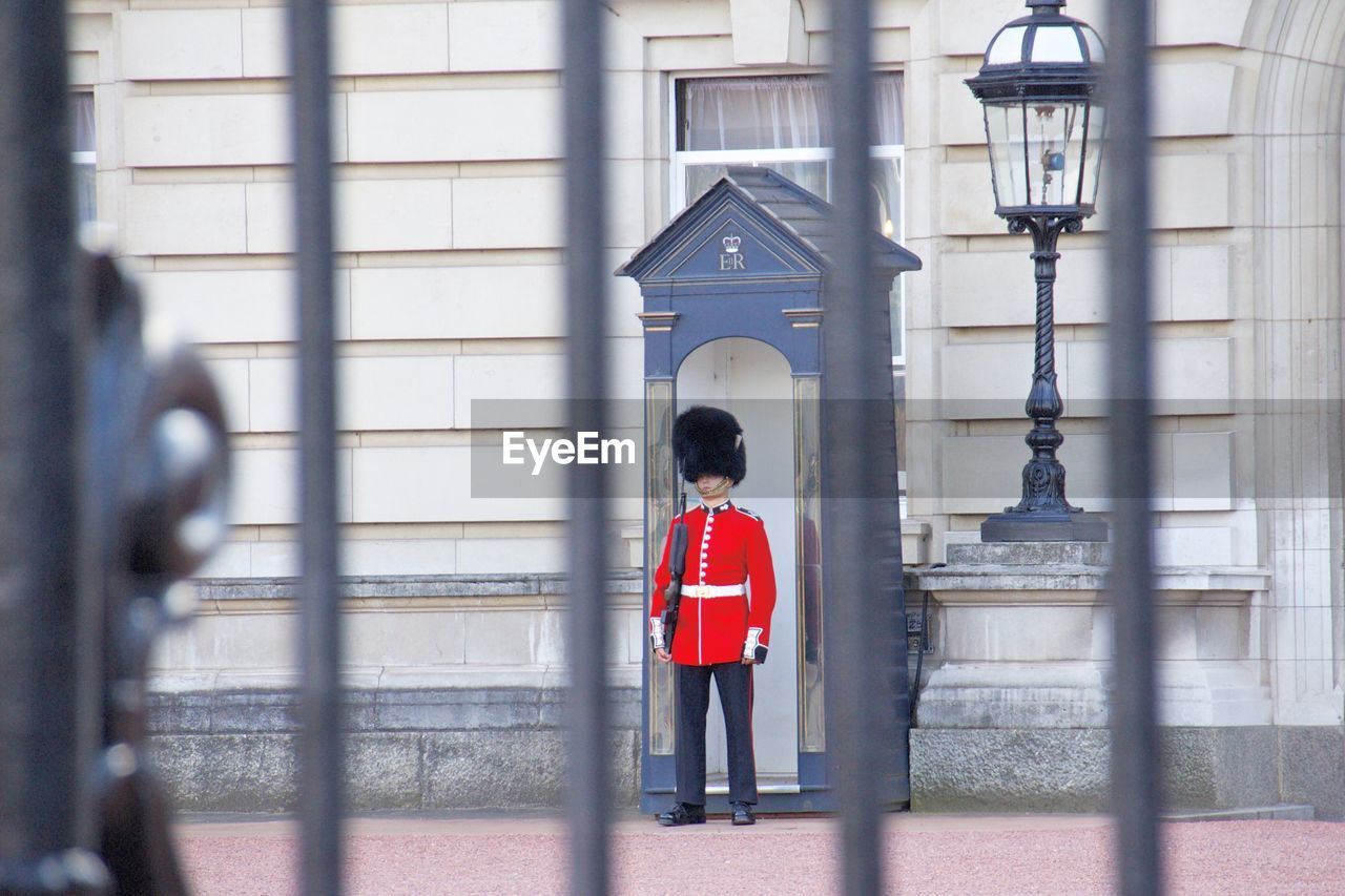 MAN IN RED CONTAINER