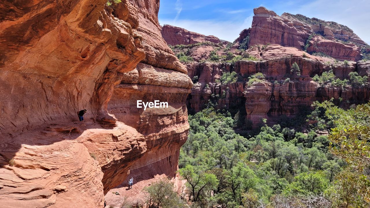 rock, rock formation, canyon, travel destinations, scenics - nature, nature, travel, beauty in nature, non-urban scene, landscape, arch, environment, land, national park, geology, sky, no people, park, wadi, mountain, plant, valley, tourism, tranquility, sandstone, tree, cliff, desert, outdoors, physical geography, eroded, tranquil scene, extreme terrain, semi-arid, day, formation, climate, sunlight, remote, terrain, mountain range, arid climate, architecture