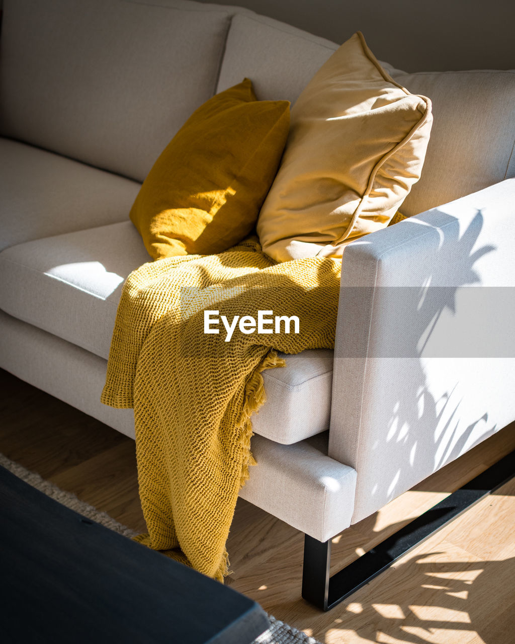 HIGH ANGLE VIEW OF SOFA RELAXING ON BED