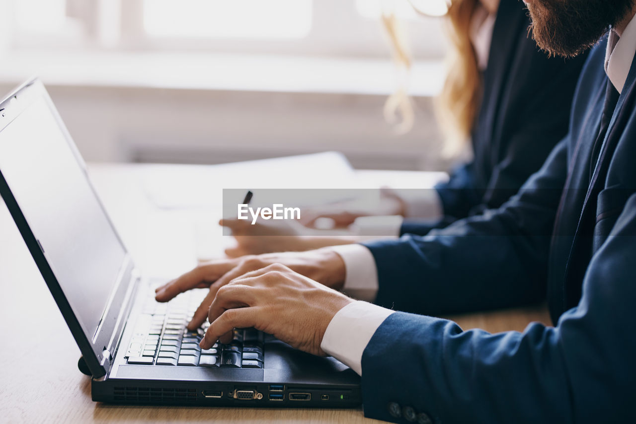 People working on laptop