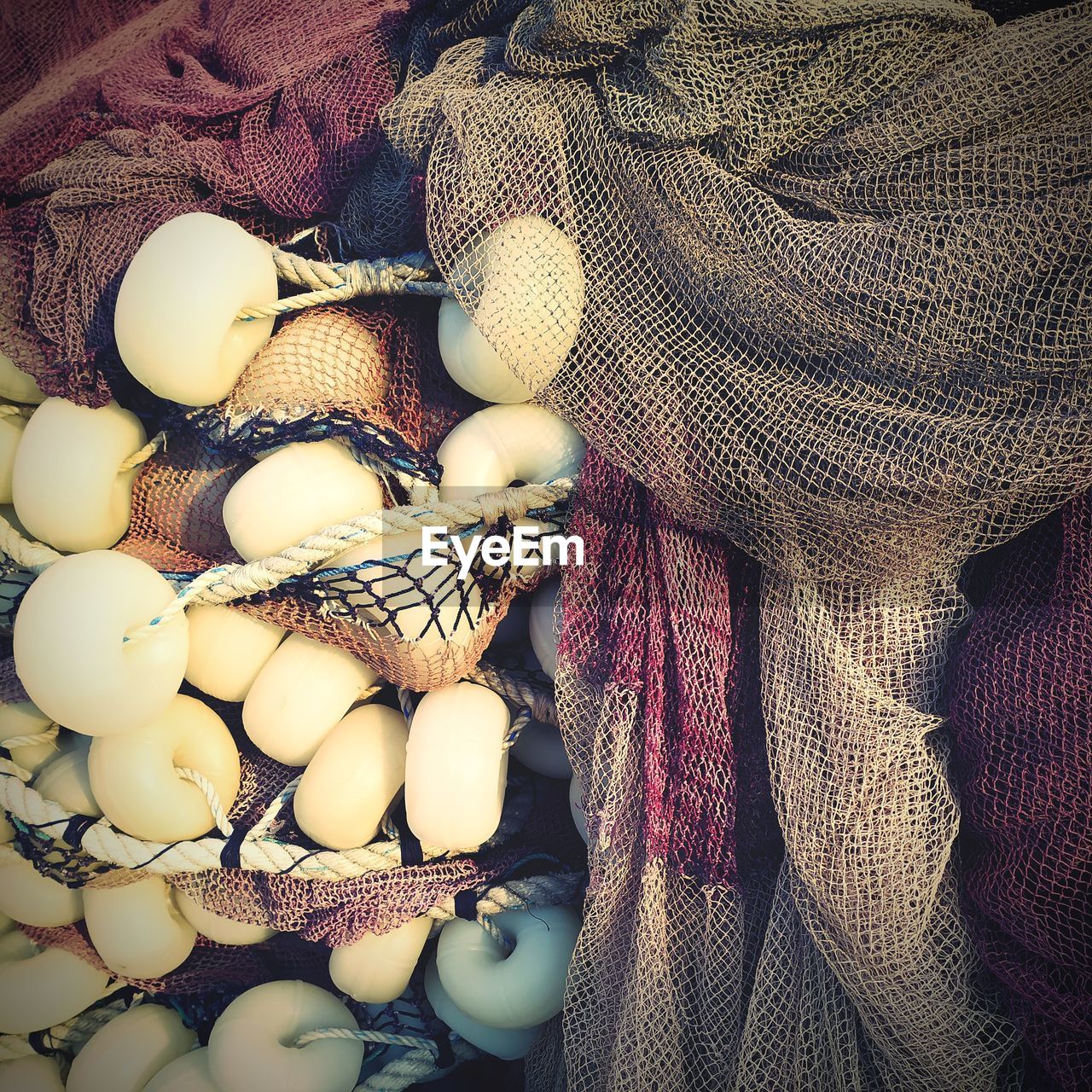 FULL FRAME SHOT OF FISHING NET AT MARKET