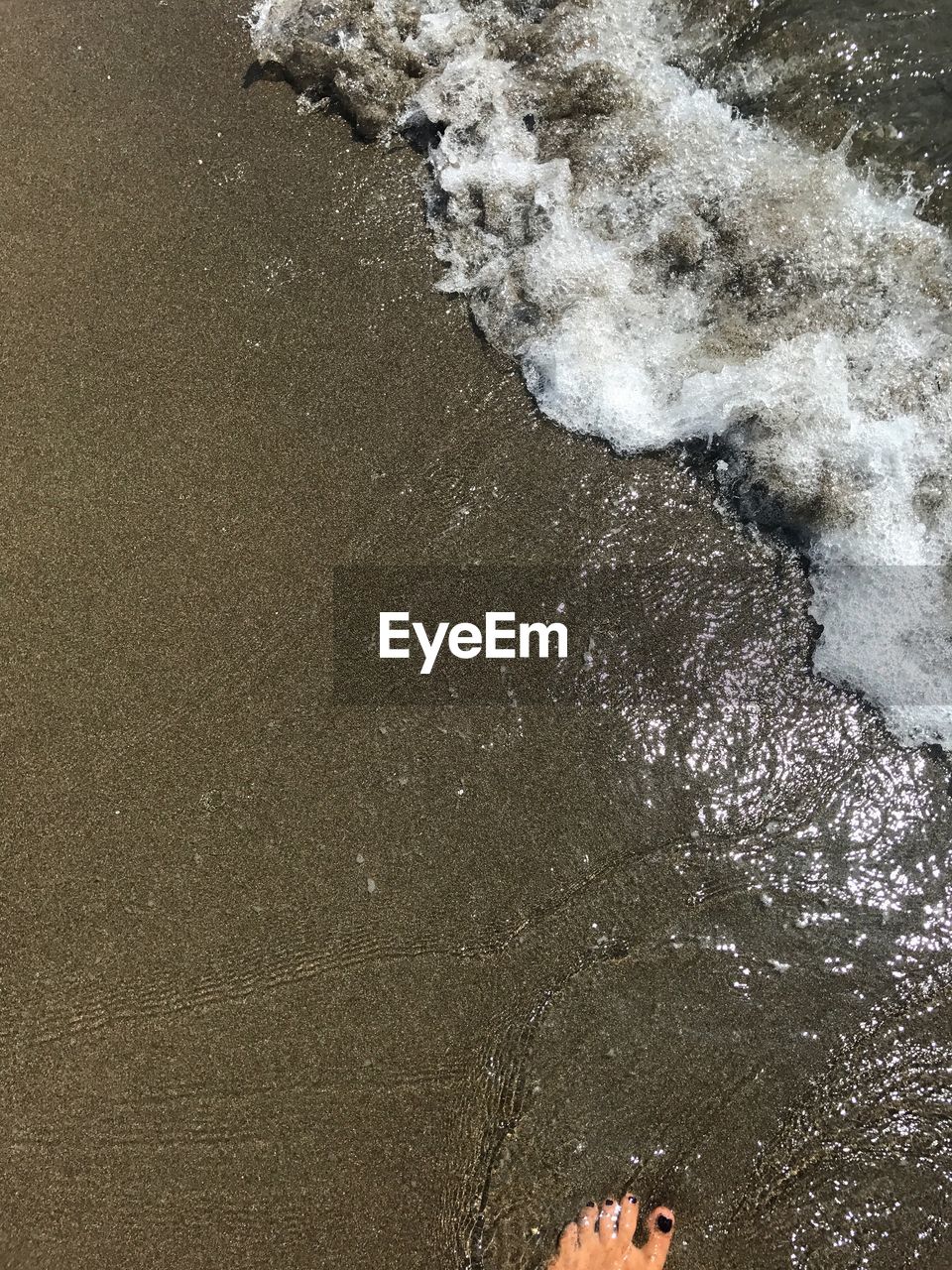 Close-up of waves on beach