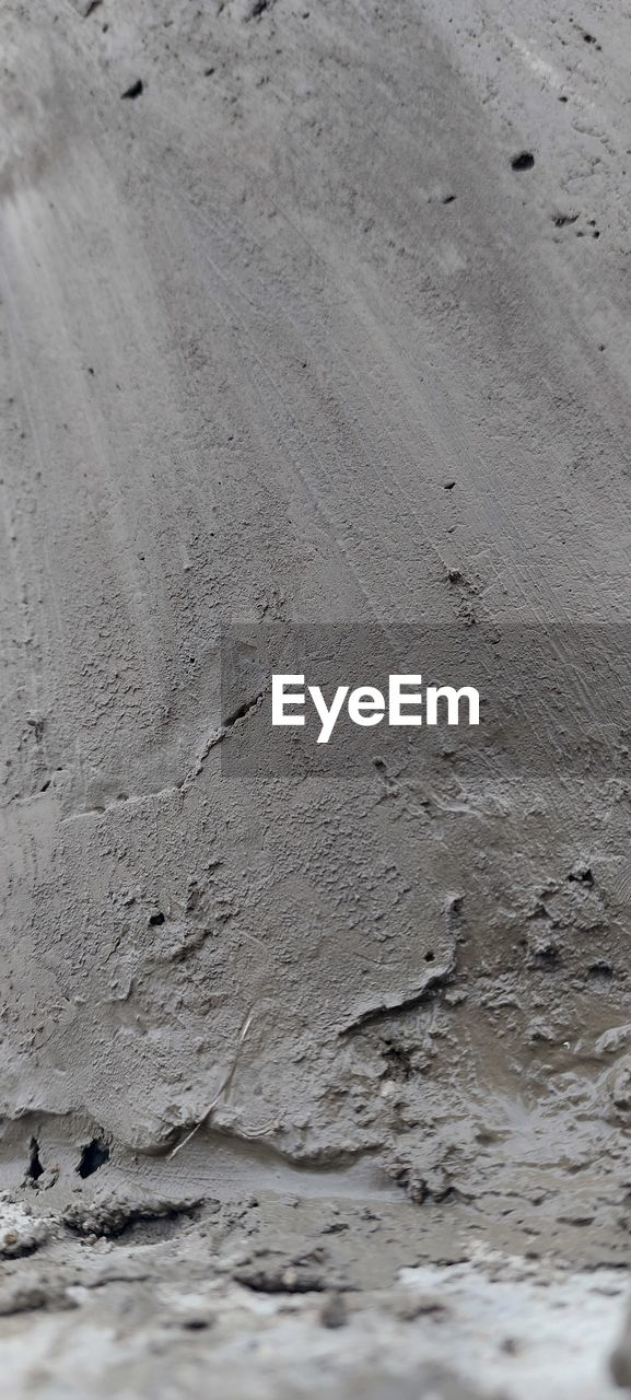 textured, full frame, no people, backgrounds, wall, close-up, pattern, wall - building feature, day, soil, built structure, wood, architecture, rough, outdoors, sand, nature, white, land, asphalt, gray