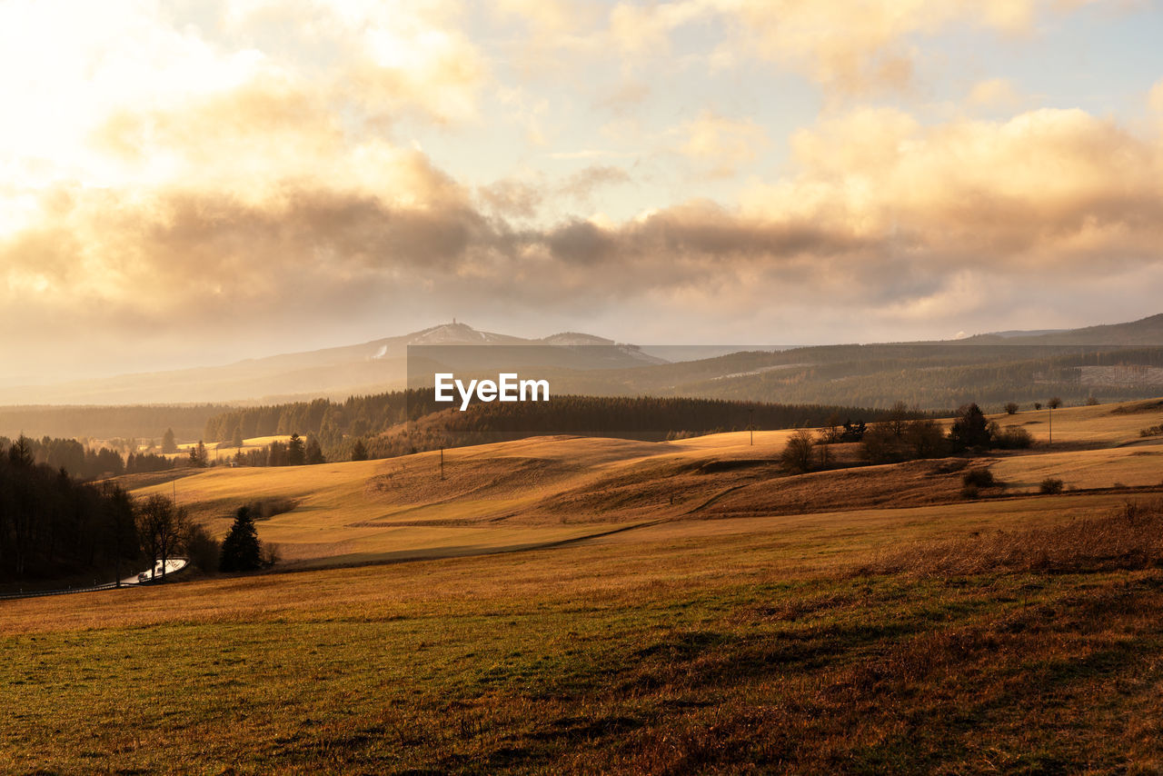 Scenic view of landscape against sky during sunset