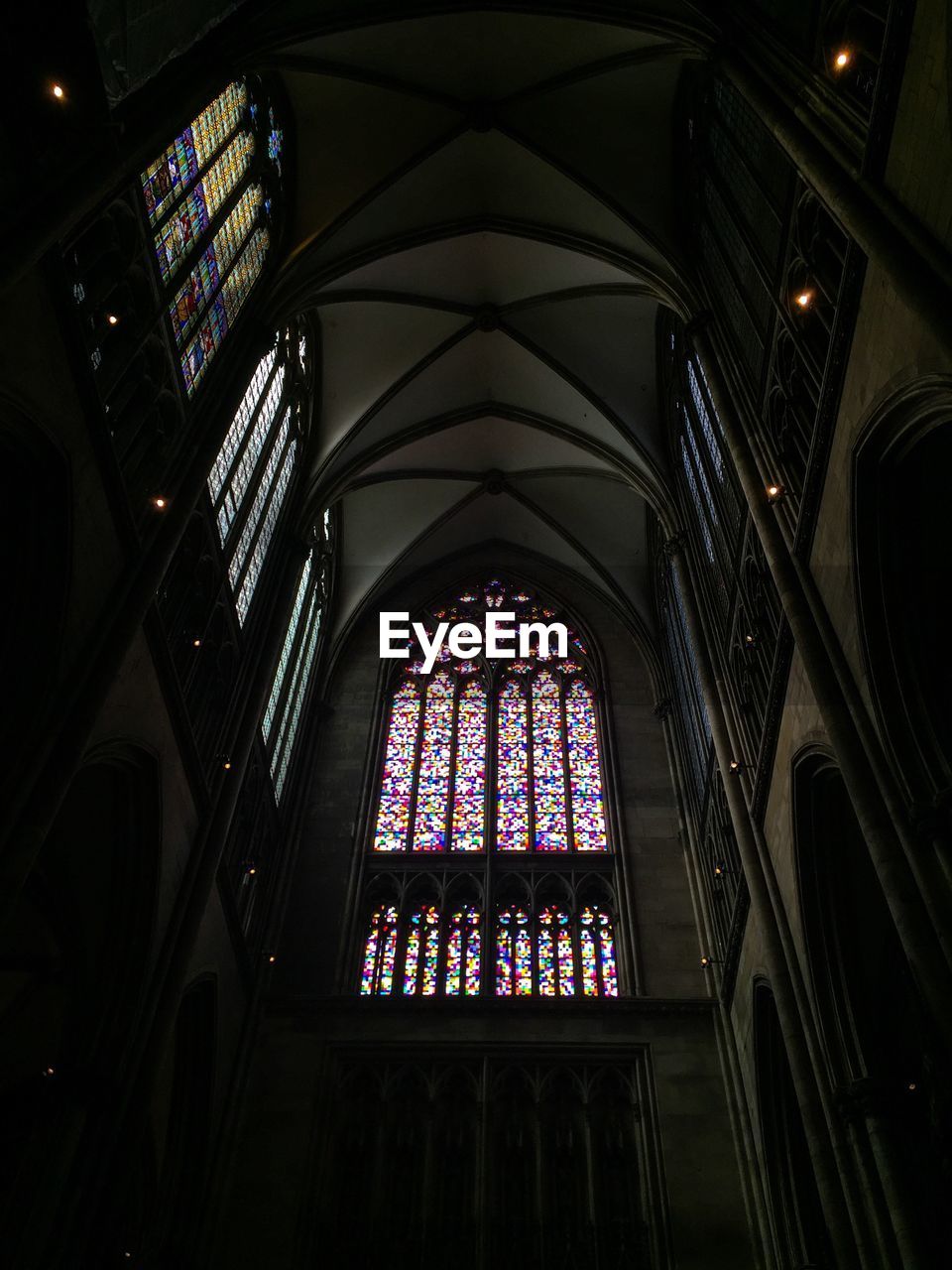 LOW ANGLE VIEW OF ILLUMINATED CHURCH