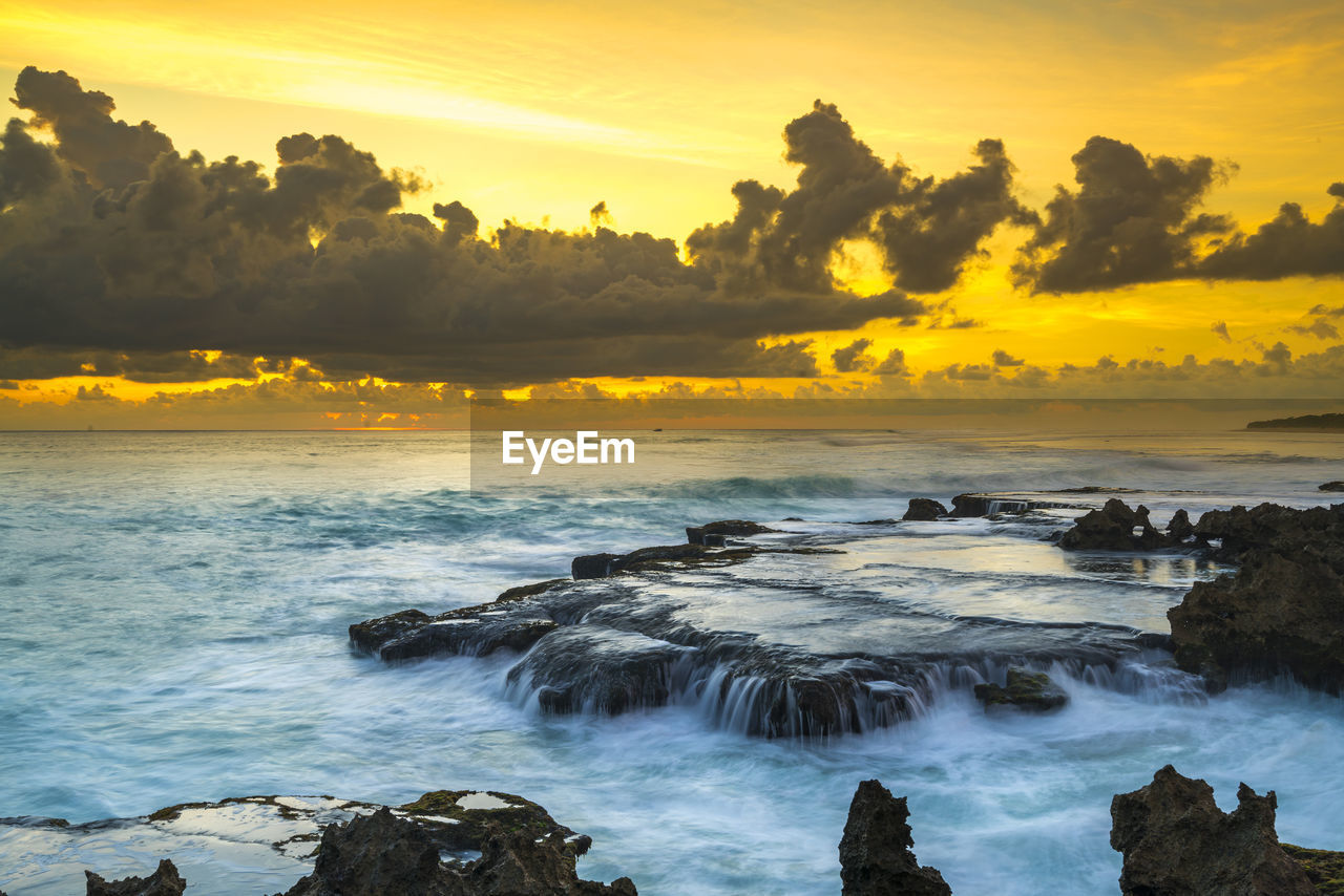 Scenic view of sea against sky during sunset