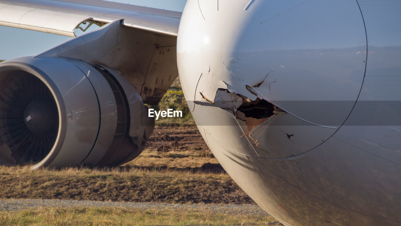 Close-up of crashed airplane on runway