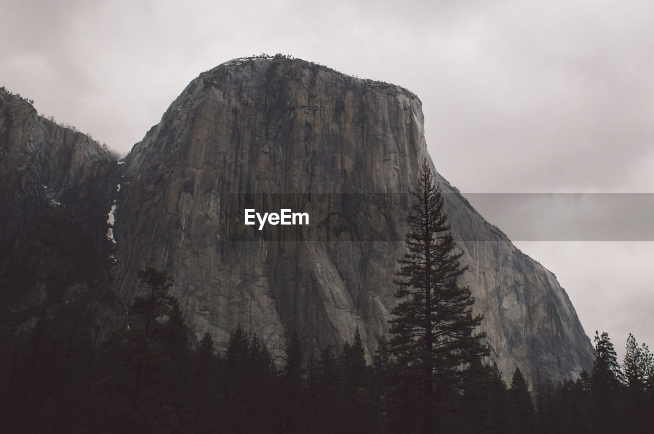 Low angle view of el capitan at yosemite national park against sky