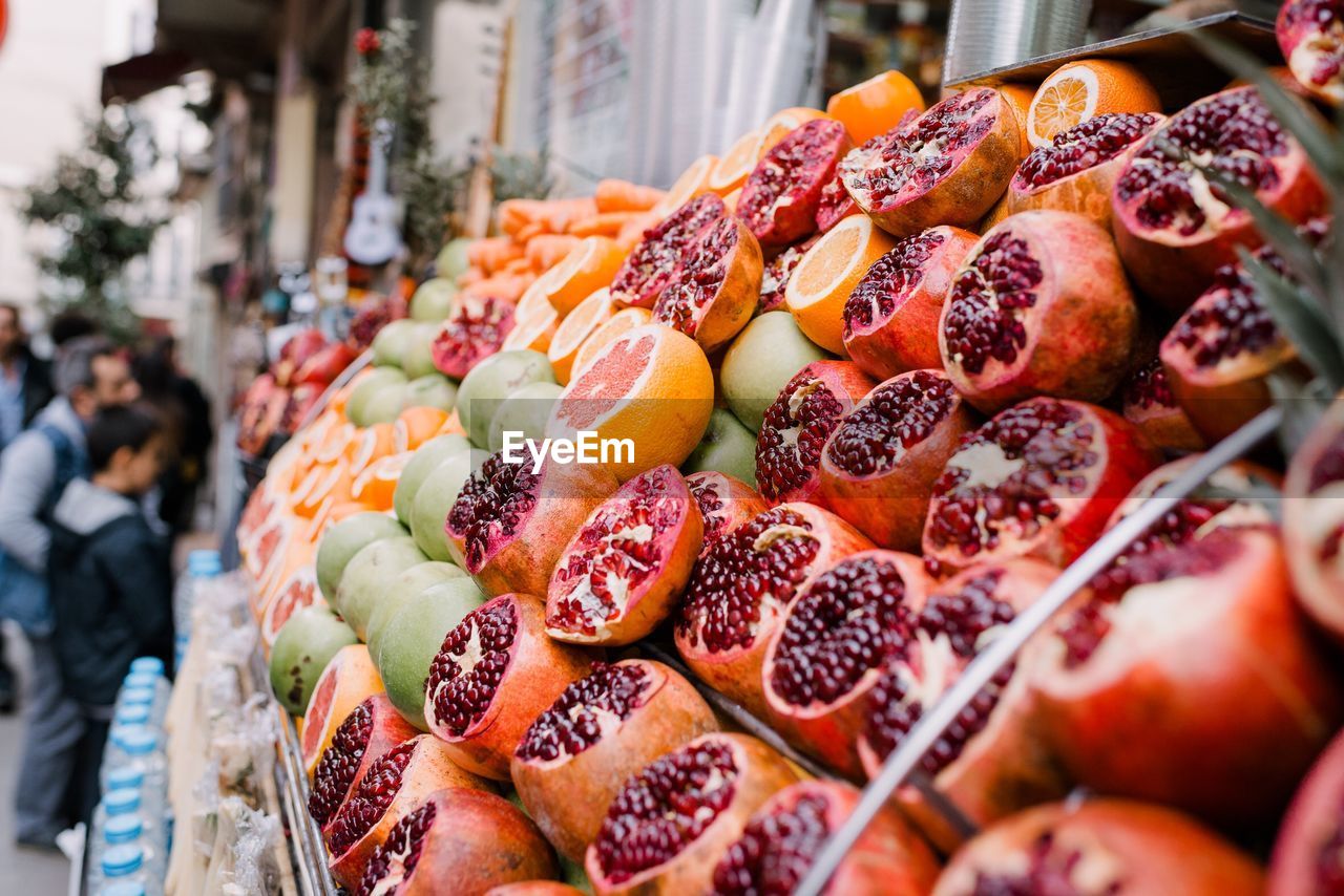 Close-up of fruits at market stall for sale