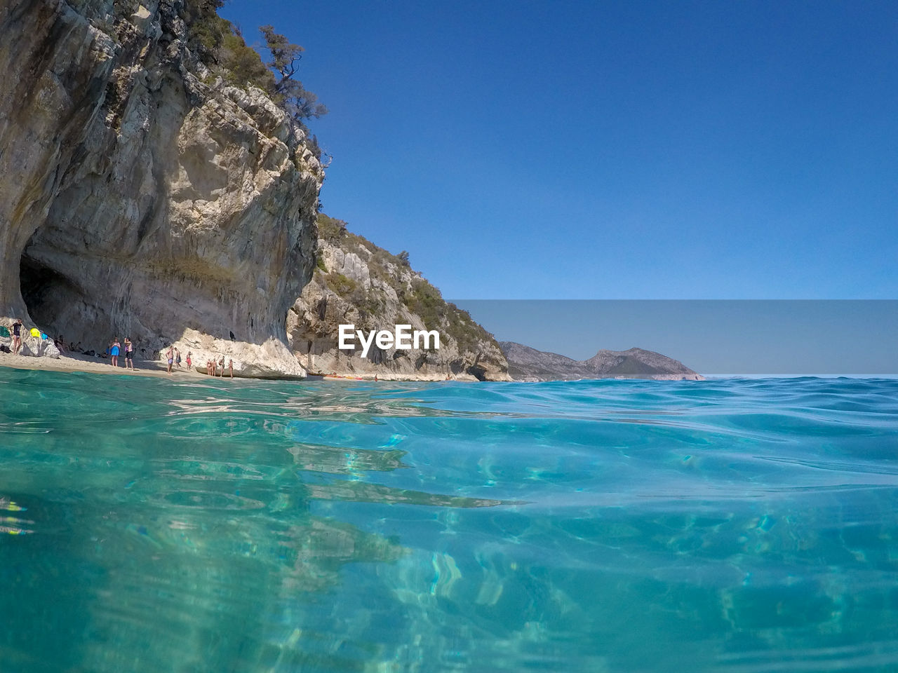 SCENIC VIEW OF BLUE SEA AGAINST CLEAR SKY