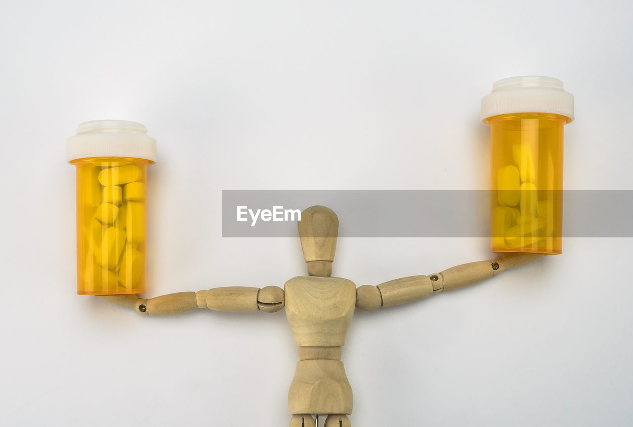 HIGH ANGLE VIEW OF BOTTLES ON TABLE