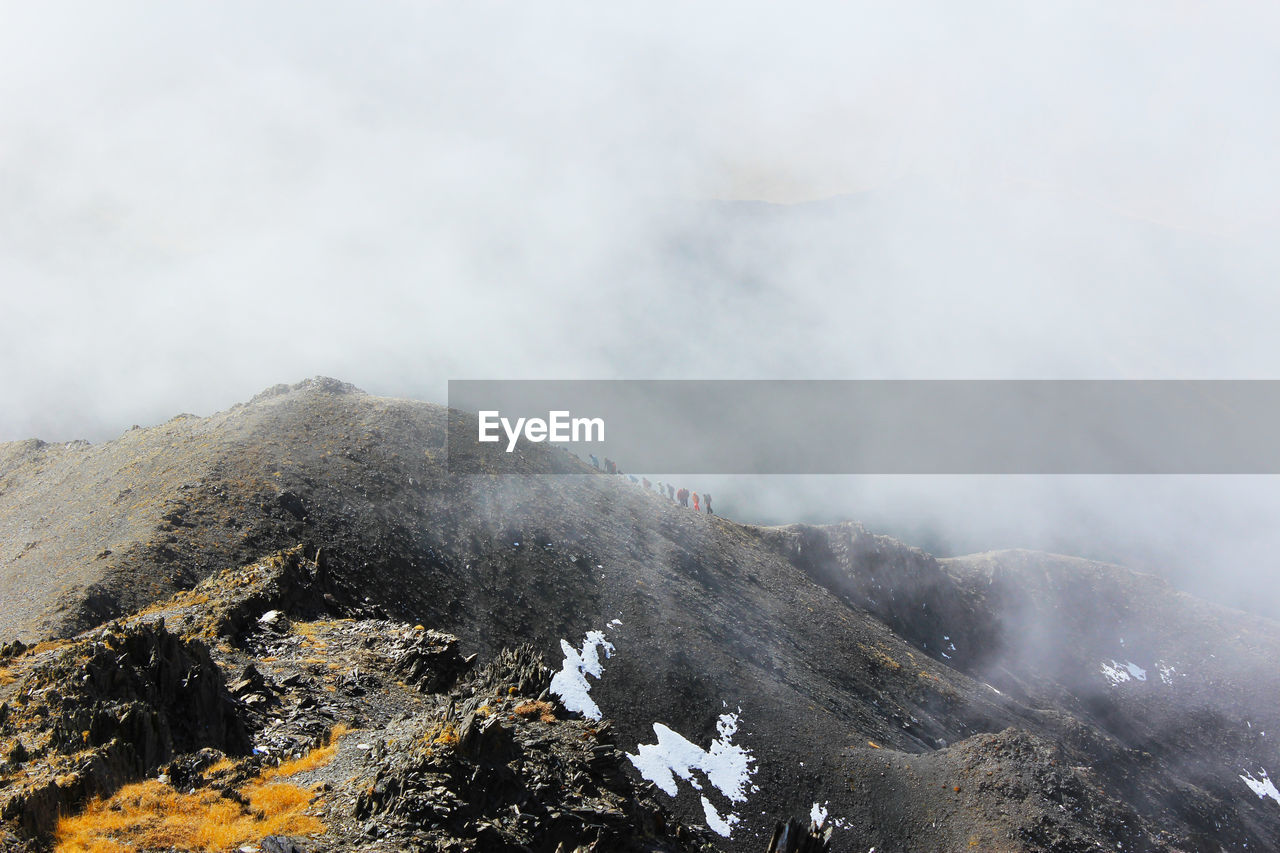 Mountain landscape in georgia, clouds, rocks, stones and alpine hiking