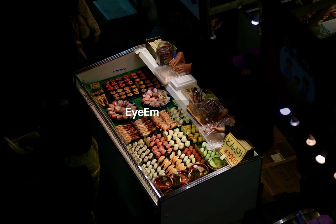 HIGH ANGLE VIEW OF FOOD FOR SALE AT MARKET