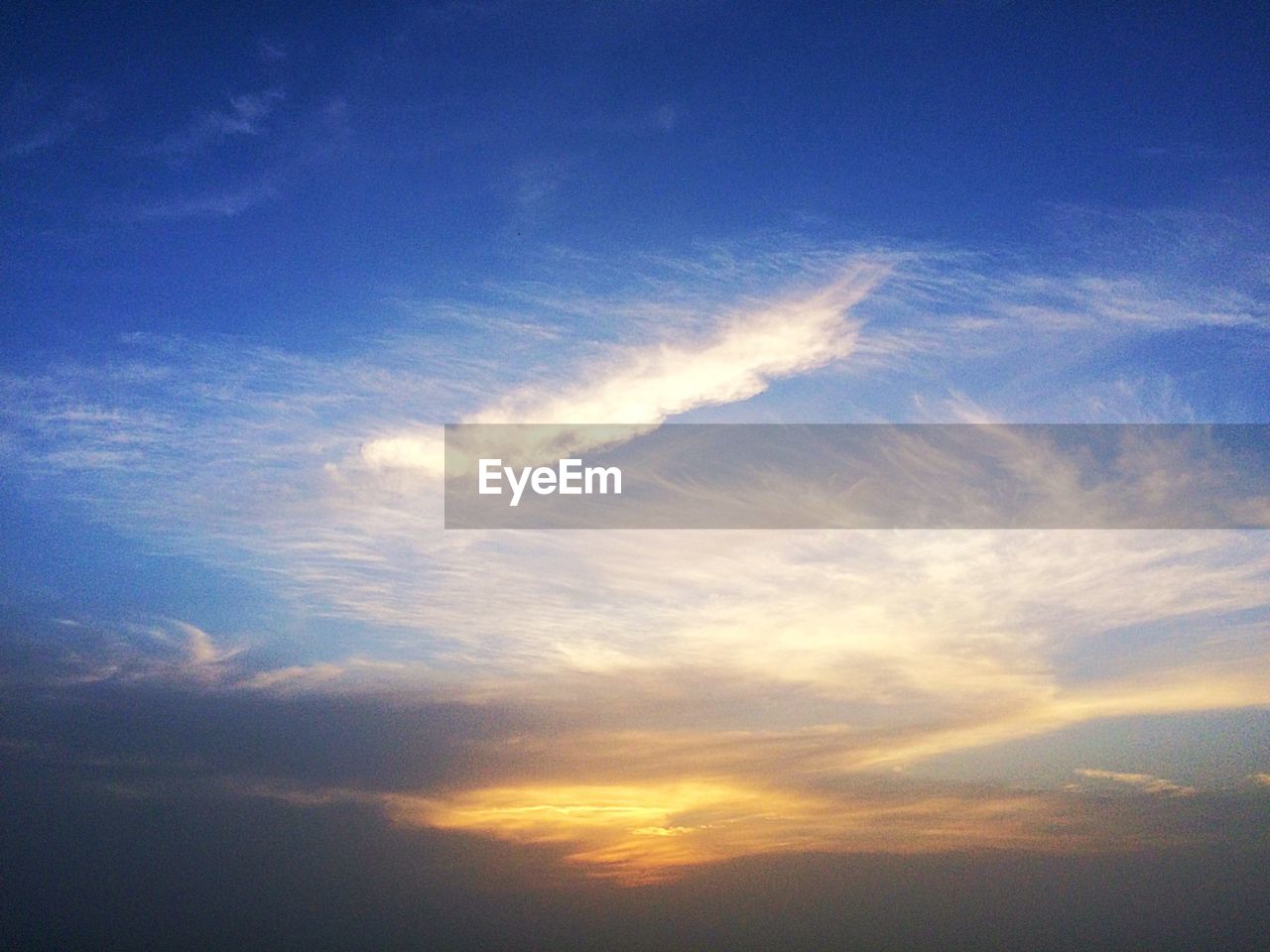 Scenic view of cloudscape at sunset