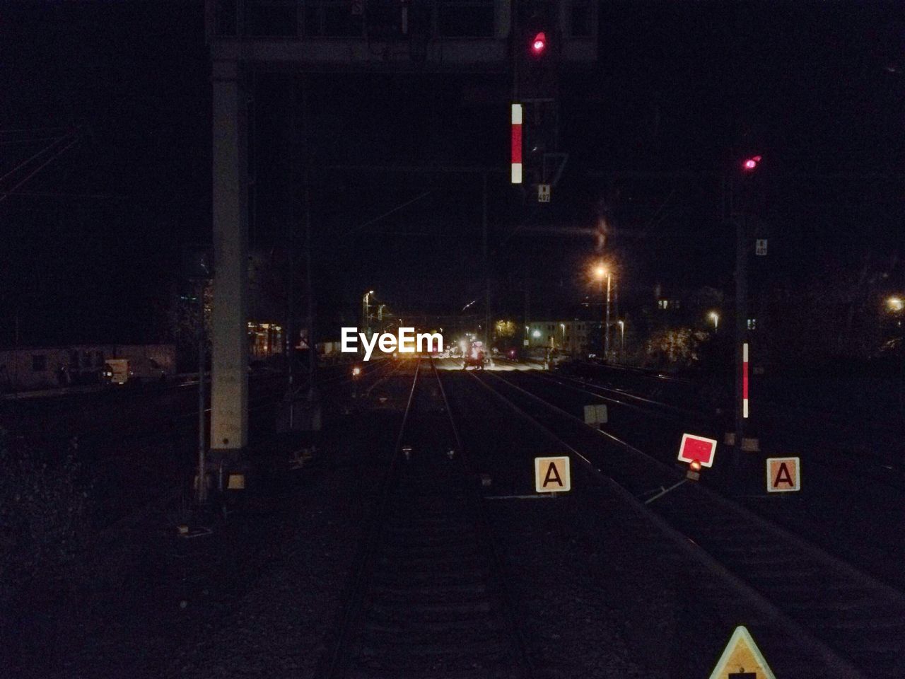 Railroad tracks at night