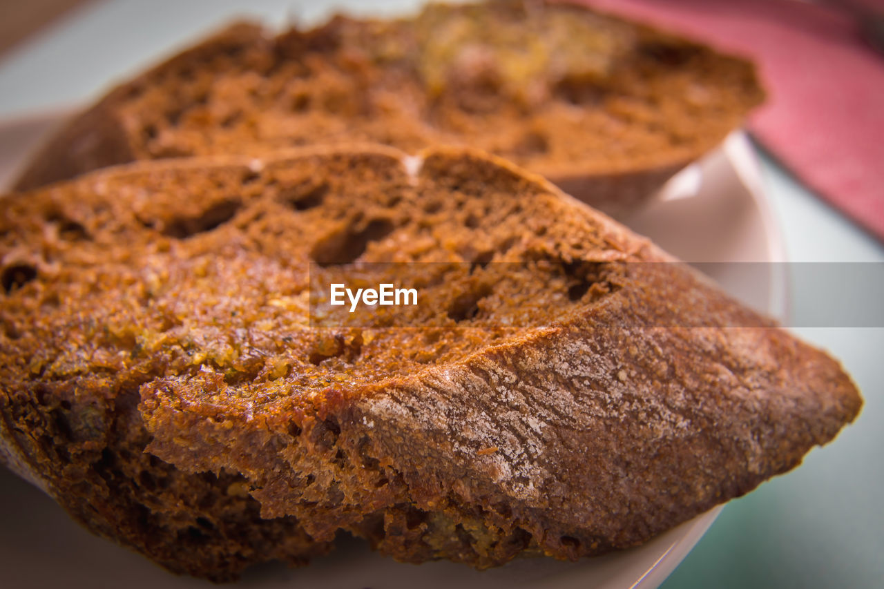 Toasted rye bread in a plate close-up. morning breakfast