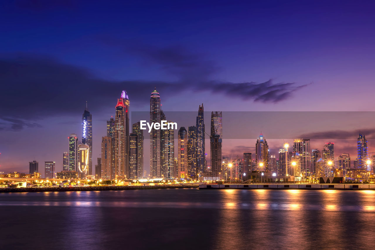 Amazing dubai marina and famous jumeirah beach at sunset, united arab emirates