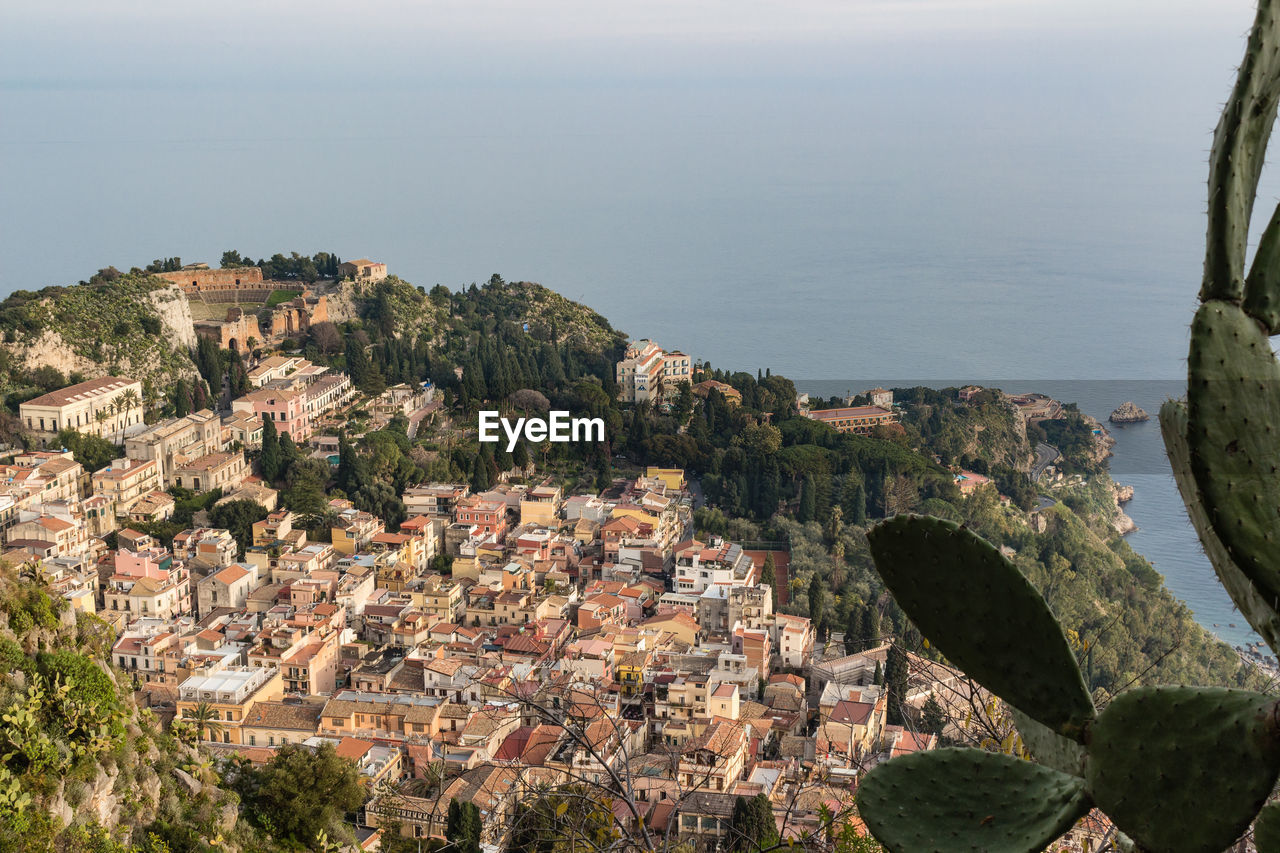 Aerial view of the taormina city, with the ancient greek amphitheatre, sicily island, italy.