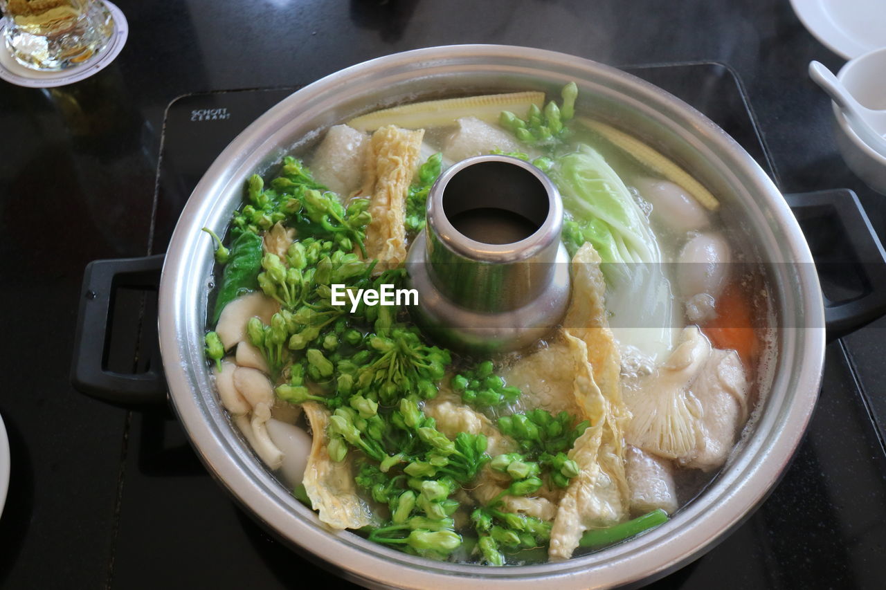 CLOSE-UP OF SOUP WITH BOWL