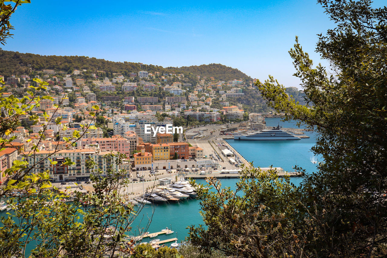 Harbour nice with yacht behind foliage